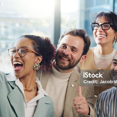 Selfie, thumbs up and business people in office smile for social media, teamwork and about us. Startup, creative agency and men with women with profile picture for company website, update and post